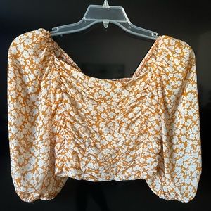 Beautiful crop top wore one time.  In excellent condition!  Medium size.